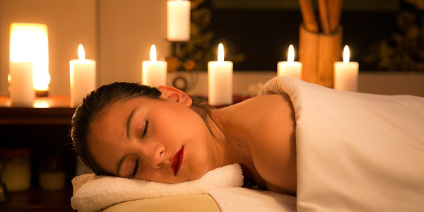 A Woman Traveller Experiences Massage Therapy During Her Travelling Schedule.